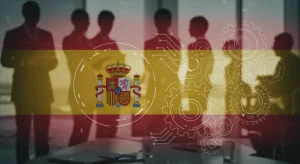 Profesionales colaborando en un entorno moderno, con elementos gráficos de innovación y la bandera de España, representando las ayudas estatales a la innovación en 2026.
